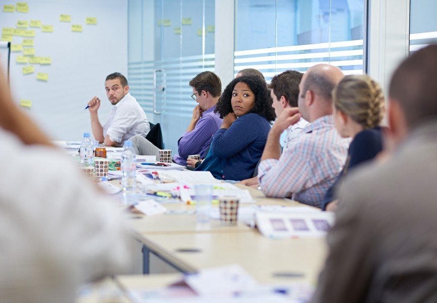 Classroom discussion in a London project management workshop